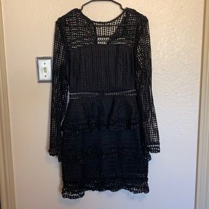 Black long sleeve short/mid length dress